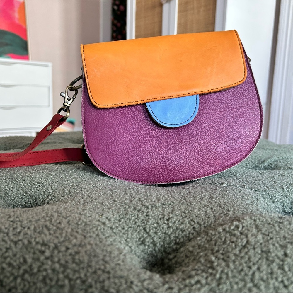 Soruka “Tango” Vibrant Purple and Orange Crossbody Bag with Bold Design